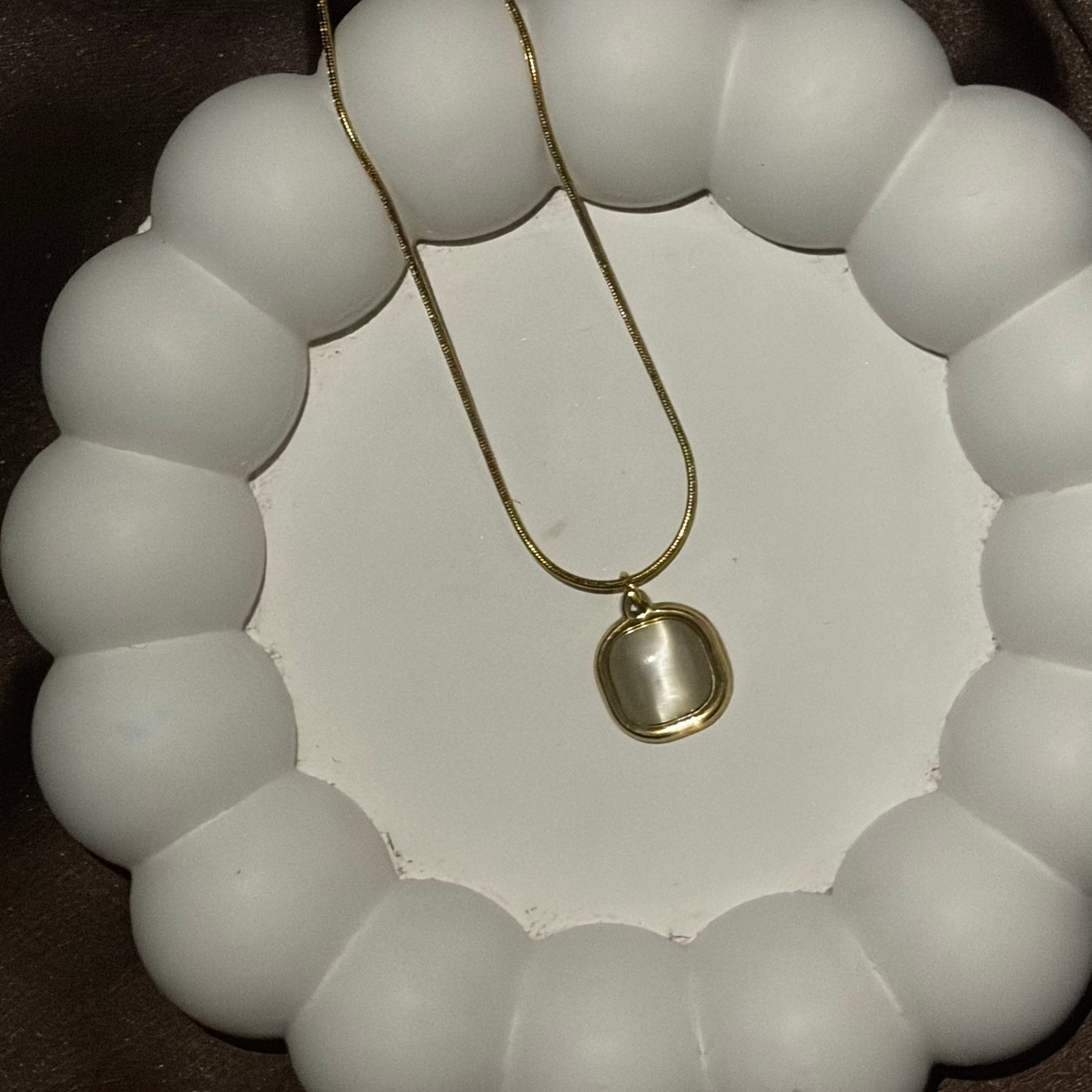 White stone pendant necklace